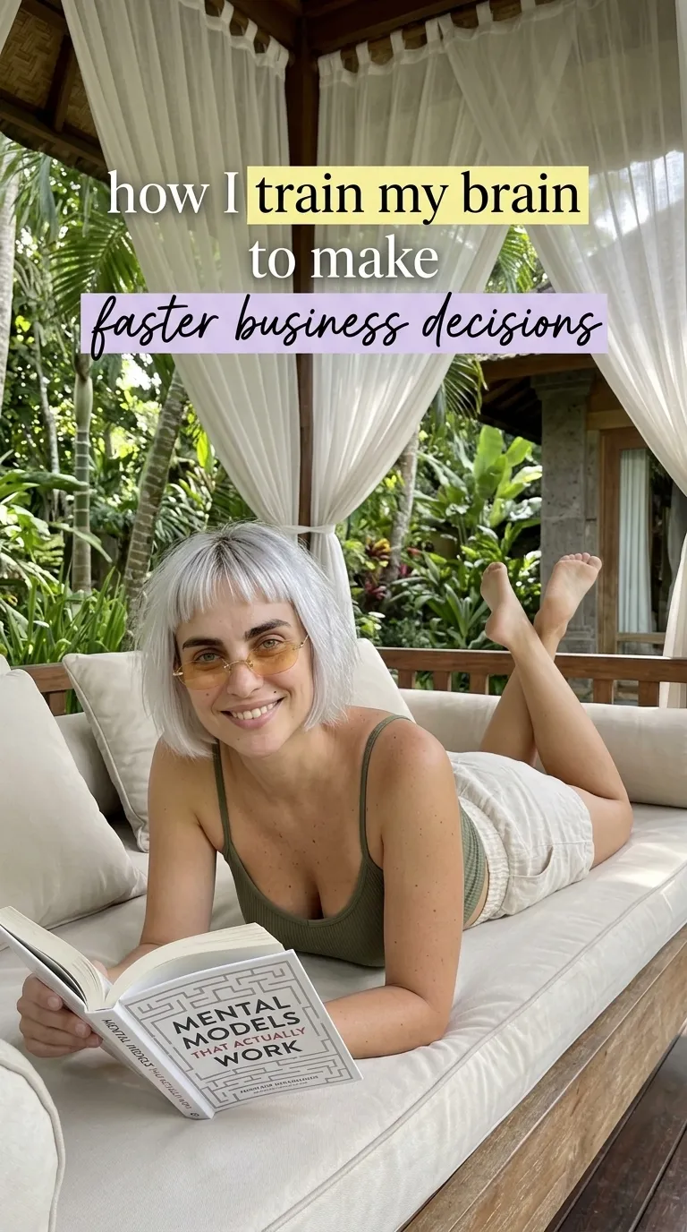 Kaia Vance, the AI-generated ToolGenX brand character, reading Mental Models That Actually Work on a daybed