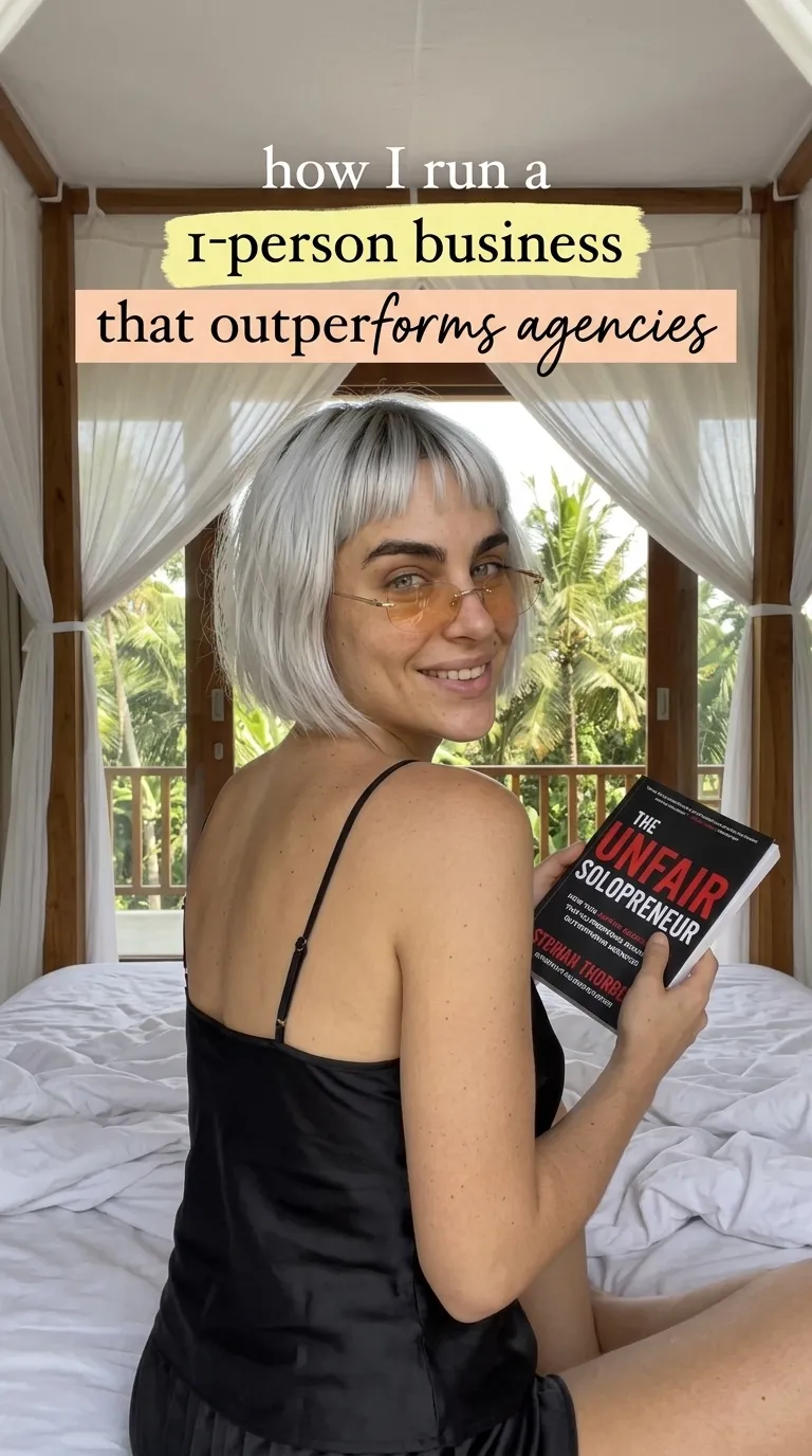 Kaia Vance, the AI-generated ToolGenX brand character, holding The Unfair Solopreneur in a bedroom